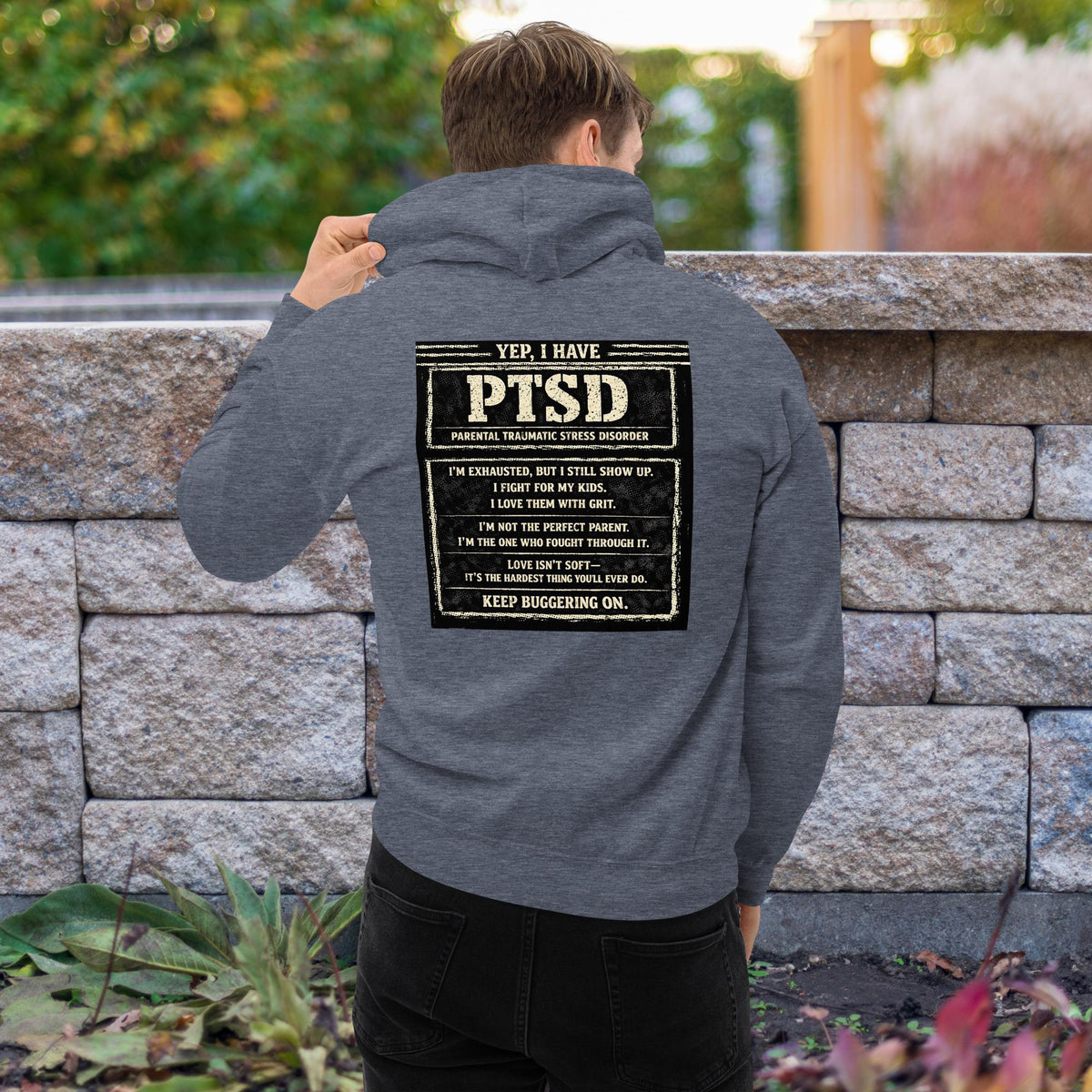 The “KEEP BUGGERING ON” Heavyweight Dad Hoodie — KBO GRIT EDITION, heather sport dark navy, back view
