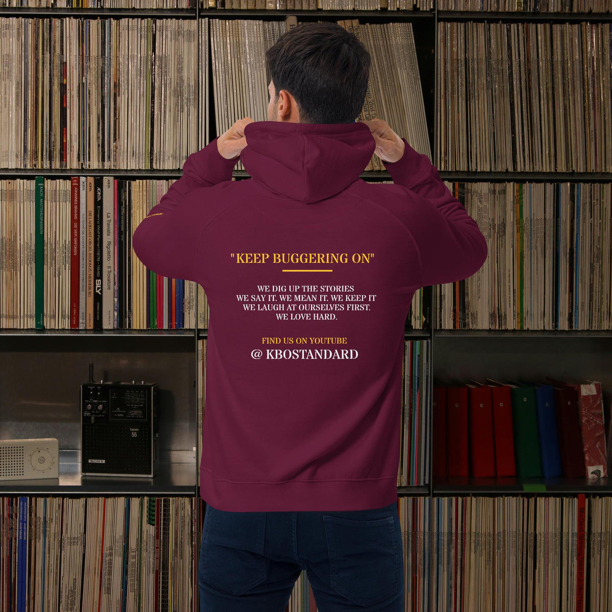 “Keep Buggering On” Premium Eco Raglan Hoodie, burgundy, back view