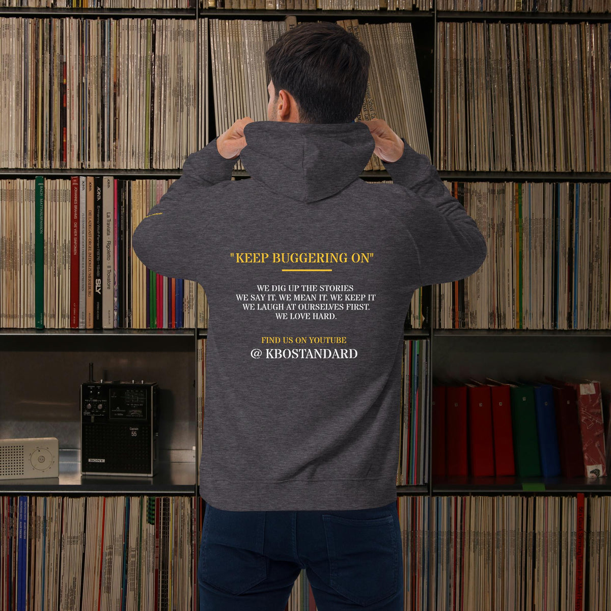 “Keep Buggering On” Premium Eco Raglan Hoodie, charcoal melange, back view