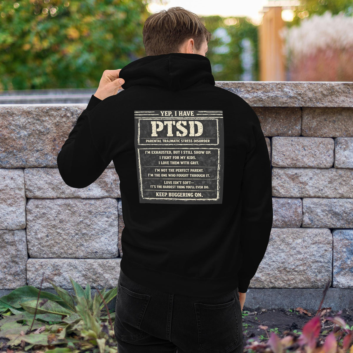 The “KEEP BUGGERING ON” Heavyweight Dad Hoodie — KBO GRIT EDITION, black, back view