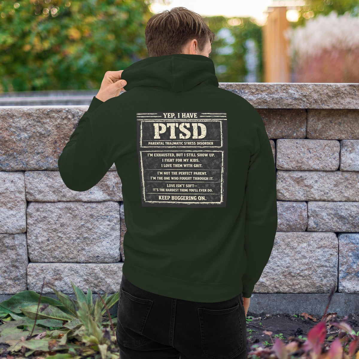 The “KEEP BUGGERING ON” Heavyweight Dad Hoodie — KBO GRIT EDITION, forest green, back view