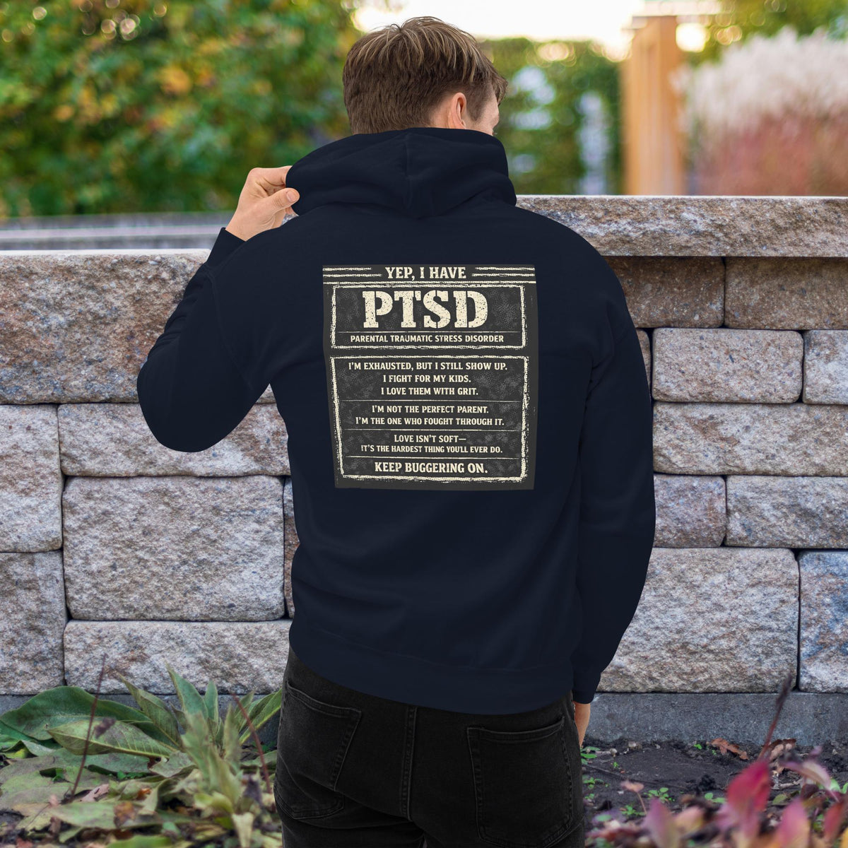 The “KEEP BUGGERING ON” Heavyweight Dad Hoodie — KBO GRIT EDITION, navy, back view